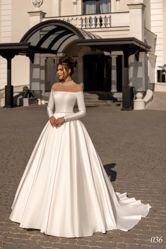 Luxury Satin High Collar A-Line Bride Dress Full Sleeves Beading Pearls Of Neck Elegant Wedding Gowns Champagne