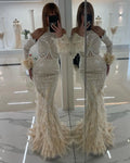 Charming Halter Pearls Tassel Dubai Evening Dresses Mermaid Long Sleeve Illusion Feathers Saudi Arabic Formal Party Gown