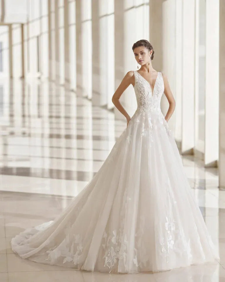 Graceful A-Line Wedding Gown with Spaghetti Straps, Elegant V-Neckline, and a Flattering Natural Waist for a Romantic and Timeless Bridal Look
