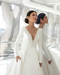 Elegant Satin Wedding Dresses Long Sleeve Princess Bride Dress Beads Pearls V Back Court Train Wedding Gowns Church Mariage