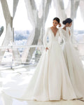 Elegant Satin Wedding Dresses Long Sleeve Princess Bride Dress Beads Pearls V Back Court Train Wedding Gowns Church Mariage Beige