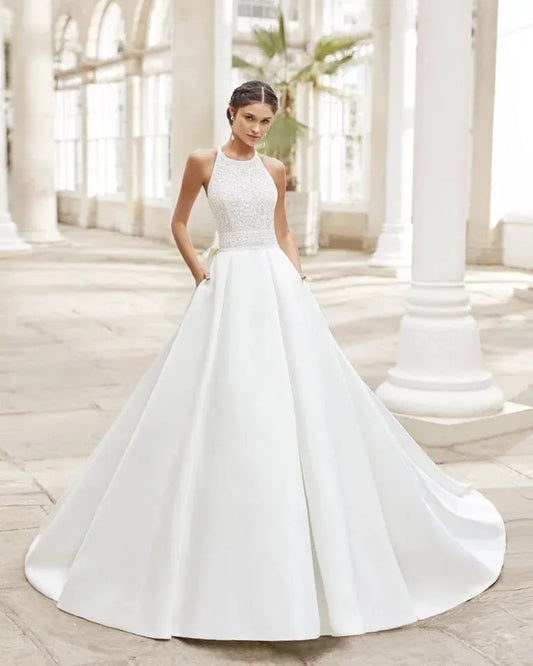 Elegant Strapless A-Line Wedding Gown with High Neckline and Delicate Lace Detailing for a Timeless Bridal Look