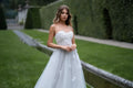 Love Elegant Lace Applique Sweetheart 3D Flowers Sequins Tulle Wedding Dress Strapless A-Line Floor Length Backless Bridal Gowns