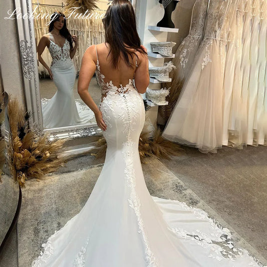 Sexy Ivory Boho Lace V-neck Wedding Dresses Spaghetti Straps Mermaid Bridal Dress Appliqued Lace Backless Wedding Gowns