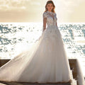 Princess High Neck Wedding Dresses Long Sleeve Lace Appliques Modern Button Bride Gowns Illusion Backless vestido de casamento White