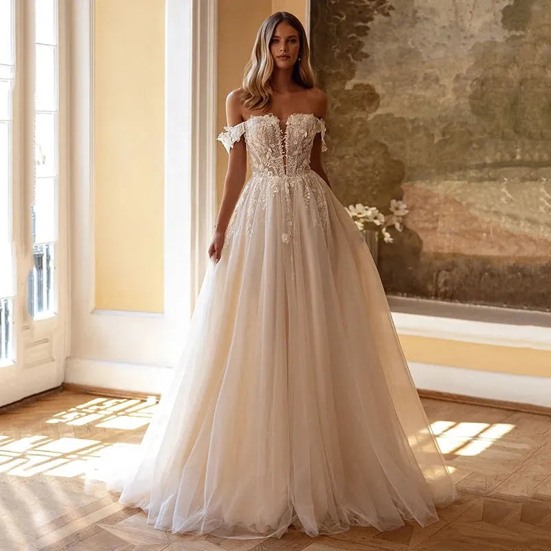 Vestidos de novia de corte princesa en A, blancos, con hombros descubi