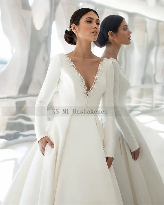Elegant Satin Wedding Dresses Long Sleeve Princess Bride Dress Beads Pearls V Back Court Train Wedding Gowns Church Mariage