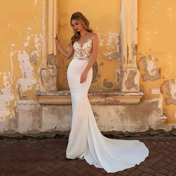 Charming Wedding Dresses Sweetheart Bridal Robes Lace Appliques Sleeveless Backless Mermaid Luxury Gowns Vestidos De Novia White