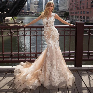 Luxury Exquisite Wedding Dresses Sleeveless Mermaid Floor Length Bridal Gowns Lace Appliques Sexy Robes Vestidos De Novia Champagne