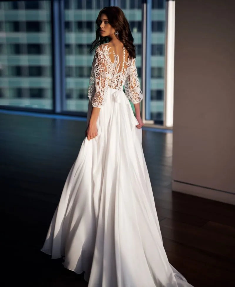Romantic Beach A-Line Wedding Dresses Three Quarter Lantern Sleeves Cut-Out Lace O Neck Button Back Long Train Bridal Gowns