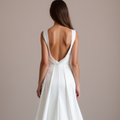 Stunning White Mermaid Wedding Dress with a Lace Bodice and Fitted Skirt