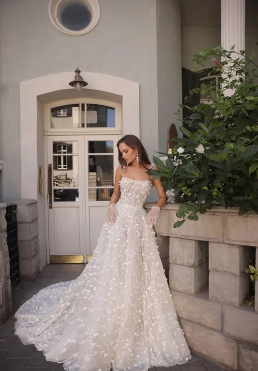 Elegant A-Line Wedding Gown with a Voluminous Skirt, Delicate Straps, Boat Neckline, and Exquisite Lace Embellishments – Romantic Bridal Dress