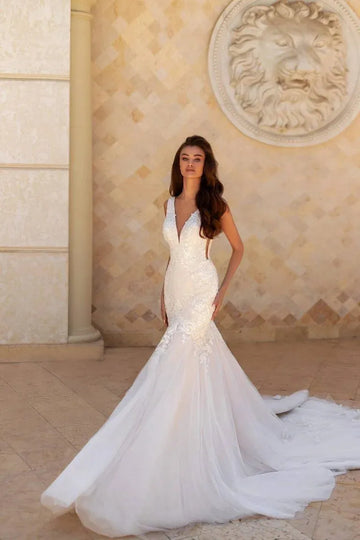 Glamorous Mermaid Wedding Gown with Spaghetti Straps, V-Neckline, and a Flattering Dropped Waist for a Striking Bridal Look - Camilla's