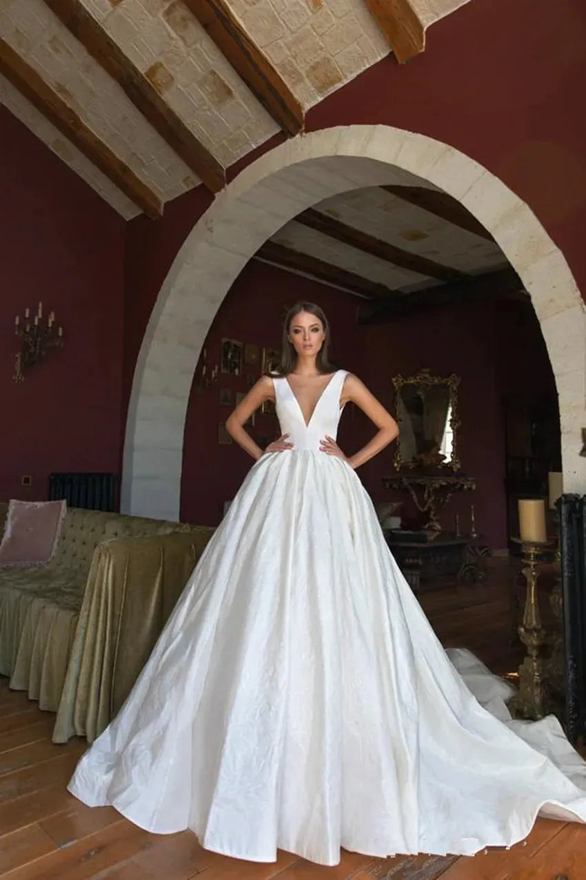 Graceful Soft Satin Wedding Dresses V Neck Backless Sleeveless Sweep Train Bridal Dress Bow Simple Plus Size Robe De Mariée