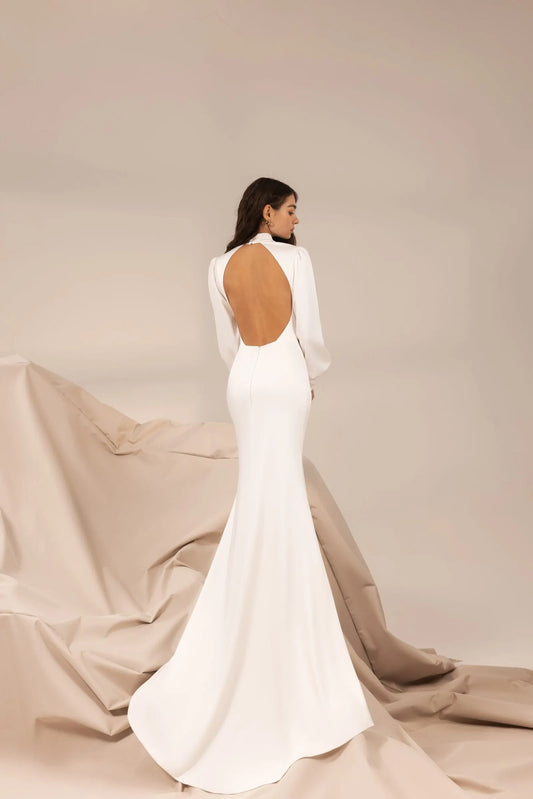 Modern Minimalist Wedding Dress with Sleek Satin, High Neckline & Elegant Open Back with Delicate Button Details for a Sophisticated Bridal Look