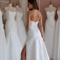 Chic White A-Line Bridal Gown with a Deep V-Neckline and Illusion Sleeves
