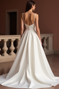 Elegant White A-Line Wedding Dress Gown with Lace Appliqué and Flowing Tulle Skirt