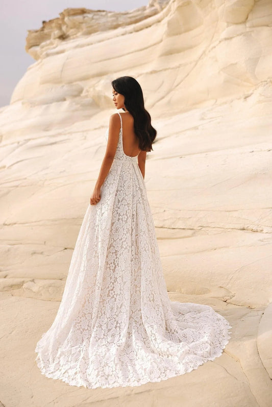 Beautiful Spaghetti Straps Wedding Dress with Lace Embellishments and a Sophisticated Slit Perfect for Brides Dresses