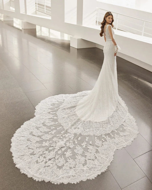 Elegant Mermaid Wedding Dress with Long Sleeves, V-Neckline, and a Flattering Natural Waist for a Sophisticated and Stunning Bridal Look