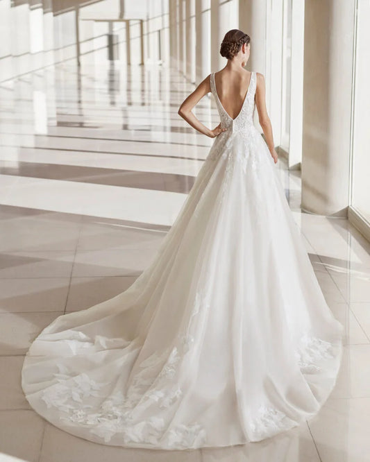 Graceful A-Line Wedding Gown with Spaghetti Straps, Elegant V-Neckline, and a Flattering Natural Waist for a Romantic and Timeless Bridal Look