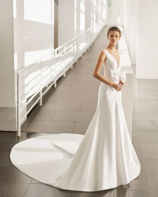 Stunning A-Line Wedding Gown with Spaghetti Straps, Elegant V-Neckline, and a Flattering Natural Waist for a Timeless and Romantic Look