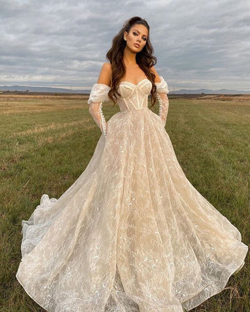 Abiti da sposa in pizzo di lorie sweether un abito da sposa a maniche lunghe