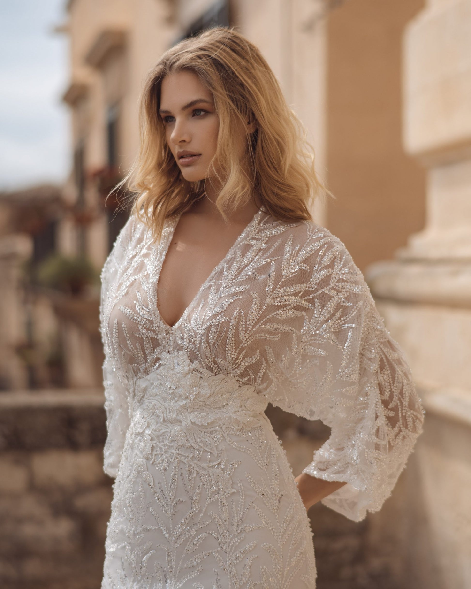 Timeless A-Line Bridal Gown with Elegant Long Sleeves, a Graceful V-Neckline for a Breathtaking and Sophisticated Wedding Look