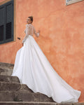 Ethereal A-Line Wedding Gown with Graceful Long Sleeves, a Flattering V-Neckline, and Luxurious Beaded Lace for a Romantic and Timeless Bridal Look