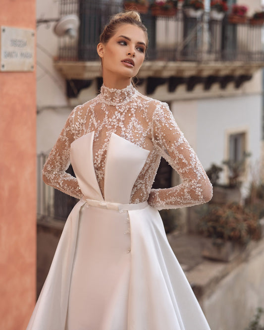 Ethereal A-Line Wedding Gown with Graceful Long Sleeves, a Flattering V-Neckline, and Luxurious Beaded Lace for a Romantic and Timeless Bridal Look