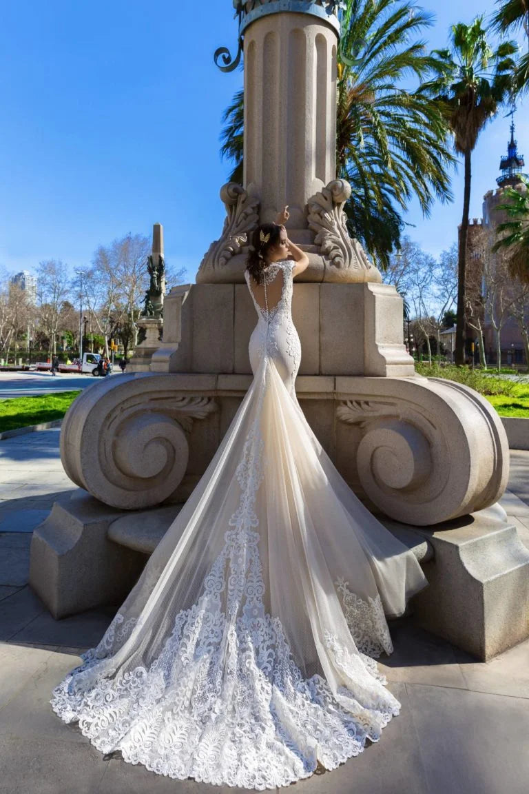 Sophisticated Mermaid Wedding Gown with Cap Sleeves, V-Neckline, and a Flattering Natural Waist for a Glamorous Bridal Look