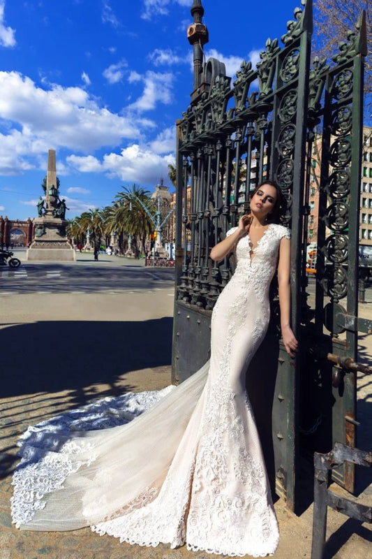 Sophisticated Mermaid Wedding Gown with Cap Sleeves, V-Neckline, and a Flattering Natural Waist for a Glamorous Bridal Look