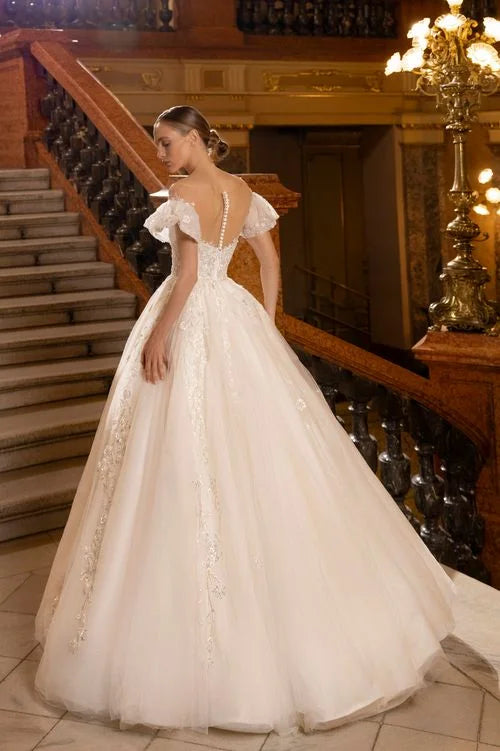 Elegant Ball Gown Wedding Dress with Cap Sleeves, Off-Shoulder Neckline, and Sequined Embellishments