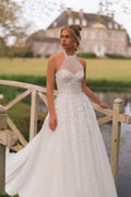 Elegant A-Line Wedding Dress with Halter Neckline, Open Shoulders, and Pearl Embellishments