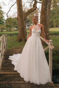 Elegant A-Line Wedding Dress with Halter Neckline, Open Shoulders, and Pearl Embellishments