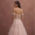 Blush Tulle Wedding Dress with Corset Bodice and Flowing Train