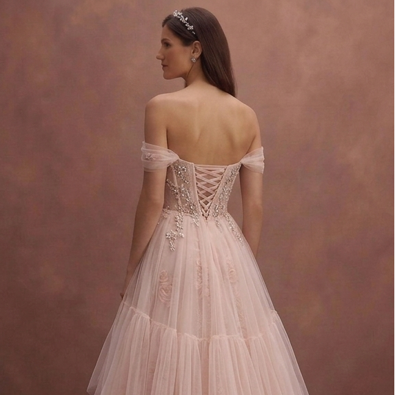 Blush Tulle Wedding Dress with Corset Bodice and Flowing Train