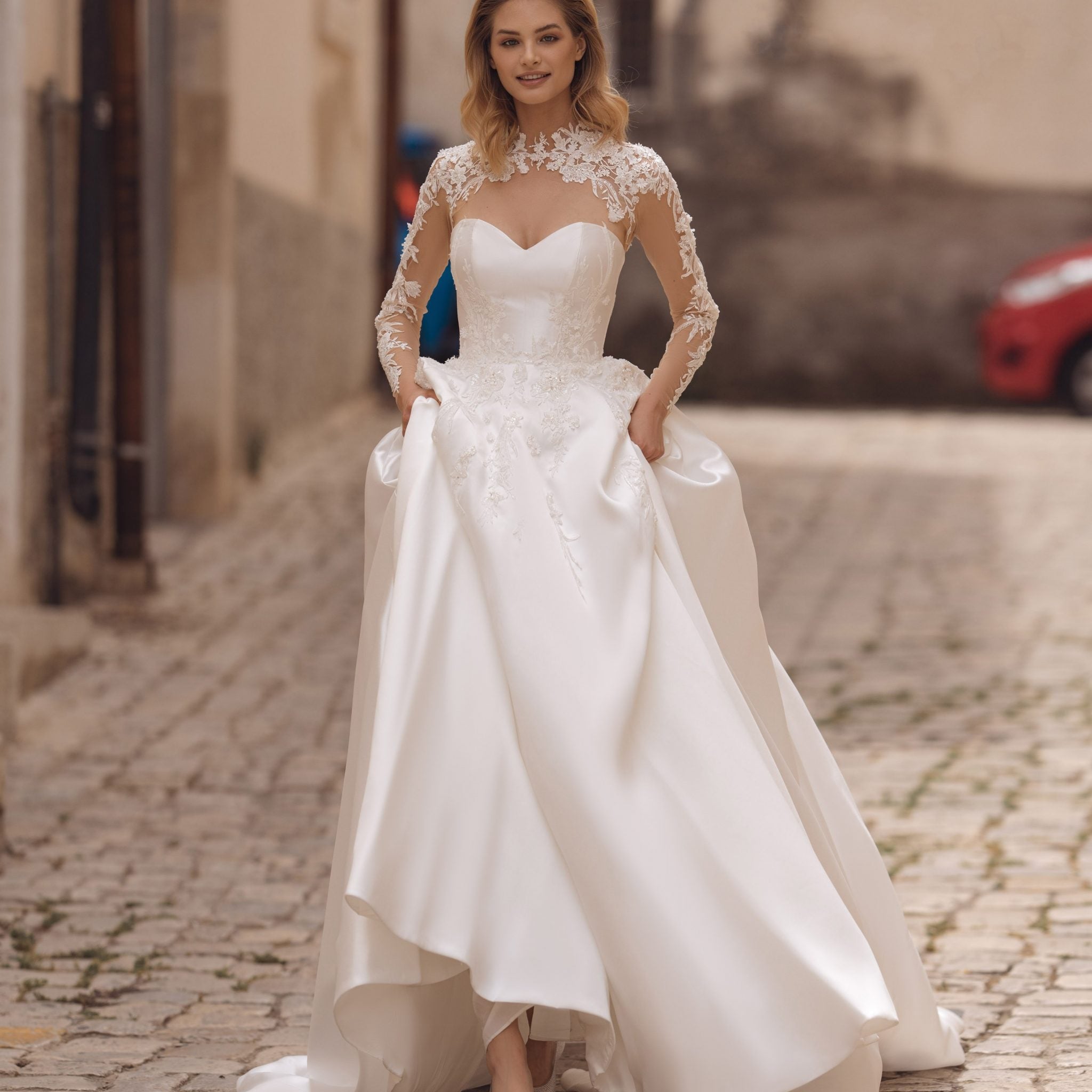 Exquisite A-Line Wedding Gown with Elegant Long Sleeves, a Dreamy Illusion Neckline, and Intricate Beaded Lace for a Timeless and Romantic Bridal Look