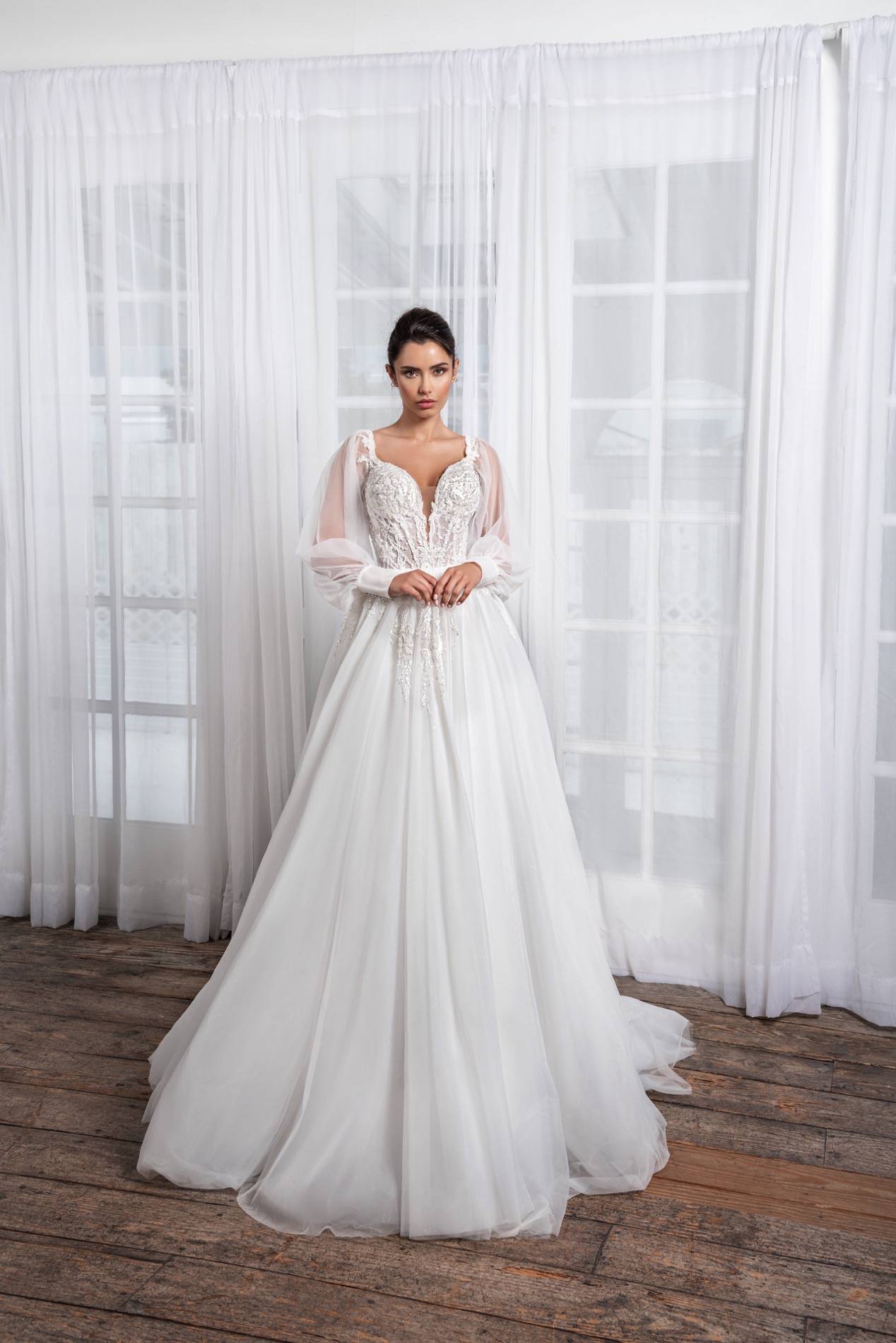 Elegant Long-Sleeve A-Line Wedding Dress with V-Neckline & Flattering Natural Waistline