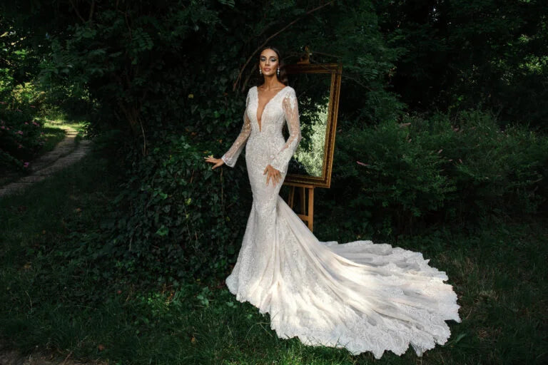 Chic Mermaid Wedding Dress with Long Sleeves and V-Neckline, Designed with a Flattering Natural Waistline for a Bold and Elegant Bridal Look