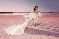 Stunning Mermaid Wedding Dress with Long Sleeves and Off-Shoulder Neckline, Designed with a Flattering Natural Waistline for a Dramatic and Elegant Bridal Look