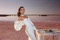 Stunning Mermaid Wedding Dress with Long Sleeves and Off-Shoulder Neckline, Designed with a Flattering Natural Waistline for a Dramatic and Elegant Bridal Look