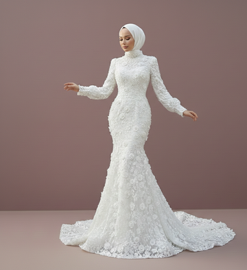 White lace wedding dress with long sleeves on a model against a brown background