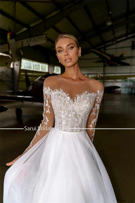 Sheer Neck with Heavy Crystals Long Sleeves White Wedding Dress Organza and Tulle A-line Bling Bridal Dress