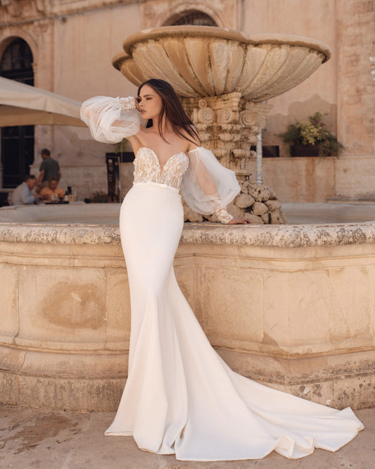 Stunning Mermaid Wedding Gown, Long Sleeves, and a Sweetheart Neckline for an Elegant and Alluring Bridal Look