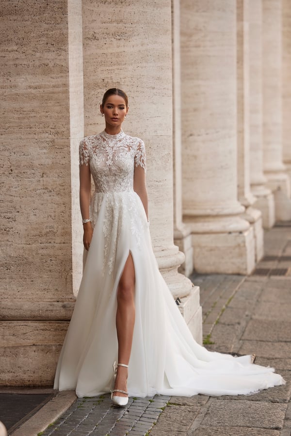 Elegant A-Line Wedding Dress with Illusion Sleeves, High Neckline, and Exquisite Embellishments