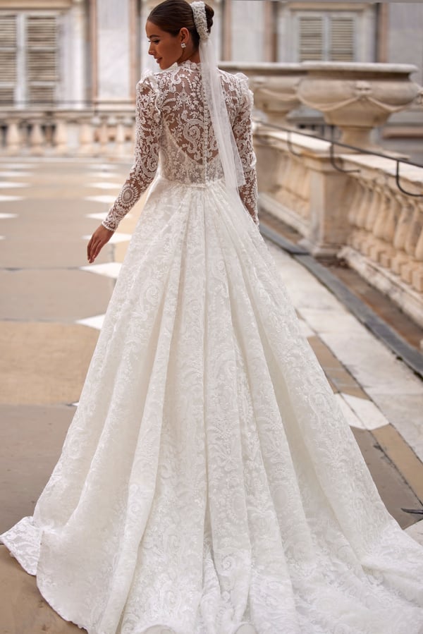 Elegant A-Line Wedding Dress with Long Sleeves, Halter Neckline, and Button Embellishments