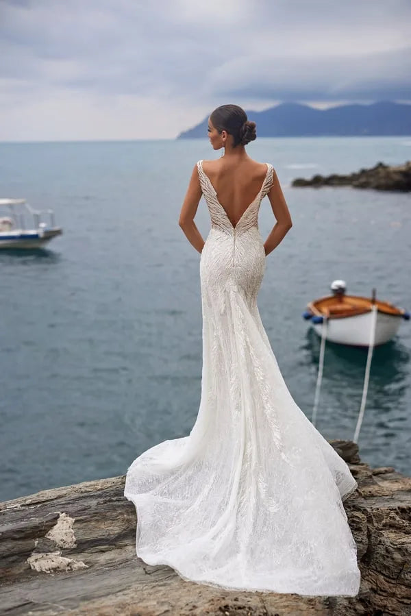 Glamorous Mermaid Wedding Dress with Sleeveless Design, V-Neckline, and Exquisite Embroidery Embellishments