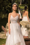 Romantic A-Line Wedding Dress with Spaghetti Straps, V-Neckline, and Elegant Sequin Embellishments