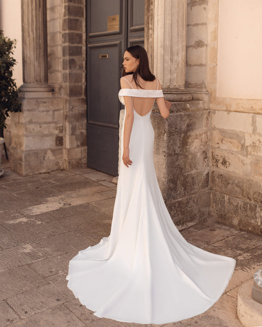 Glamorous Mermaid Wedding Gown with an Off-Shoulder Neckline and a Flattering Natural Waistline for a Breathtaking Bridal Look