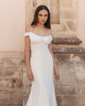 Glamorous Mermaid Wedding Gown with an Off-Shoulder Neckline and a Flattering Natural Waistline for a Breathtaking Bridal Look